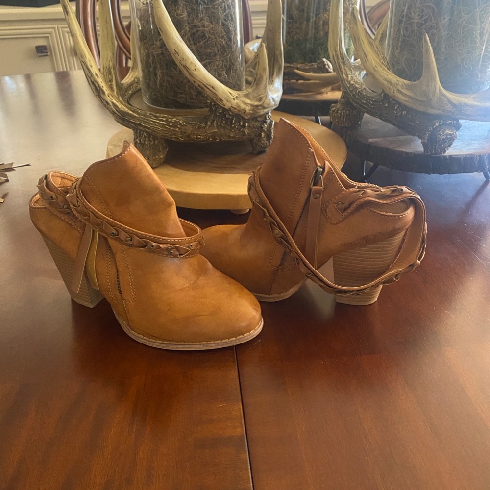 Brown booties with braided trim detail, size 6 worn 1 time
